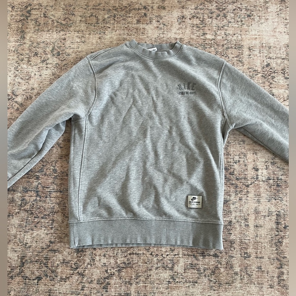 nike grey crew neck light stain not noticable
